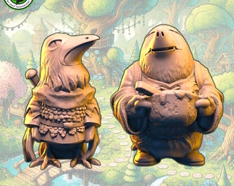 May include: Two hand-painted figurines, one of a bird wearing armour and holding a sword, and the other of a creature with a large nose holding a pot. The figurines are painted in shades of brown and beige.