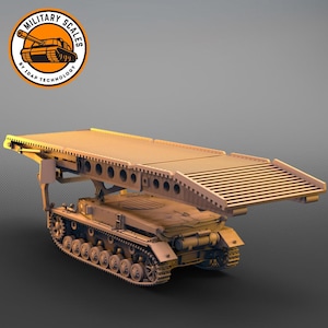 May include: A tan-colored model of a military bridge-laying tank. The model features a detailed track system and a deployable bridge. The logo "MILITARY SCALES" is visible in the upper left corner.