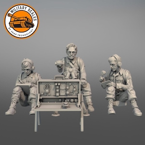 May include: Three grey plastic figures of military personnel sitting around a radio console. The figures are wearing headsets and are holding radios. The console has a variety of buttons and dials.