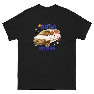 May include: A black t-shirt featuring a white van with the text "Aero the Stars" printed on it. The van has a blue and orange colour scheme and is surrounded by stars.