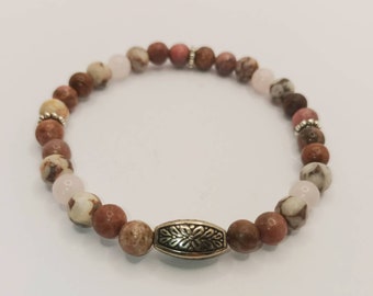 Pulsera de cuarzo rosa y rodonita hecha a mano: Joyas de cristal para el amor propio