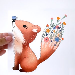 May include: A watercolour illustration of a fox with a bushy tail. The fox is sitting on its hind legs and looking up at a blue butterfly. The fox's tail is covered in colourful flowers.