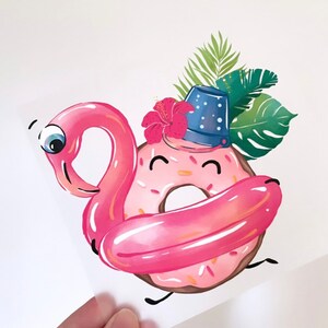 May include: A pink doughnut with a happy face wearing a blue and white polka dot hat and a pink flamingo floatie. The doughnut is surrounded by green tropical leaves and a pink hibiscus flower.
