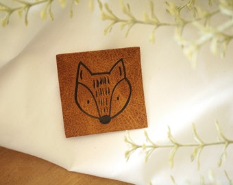 Faux leather label "fox head"