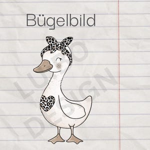 May include: A charming illustration of a white goose adorned with a leopard print headband and a heart-shaped patch. The goose features a light brown beak and feet, with the German text "Bügelbild" at the top.