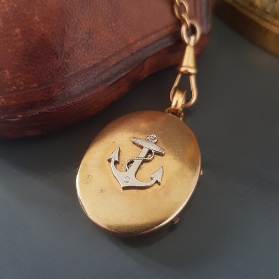 Ancien pendentif / médaillon, porte photo, décor fleurs, en métal argenté