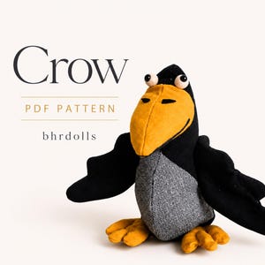 May include: A plush crow doll with a black body, gray chest, and yellow beak and feet. The doll has large, round eyes and outstretched wings. Text on the image reads "Crow PDF Pattern" and "bhrdolls".