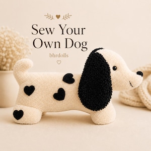 May include: A plush dog toy with a cream-colored body and black heart-shaped spots. The dog has black floppy ears and a black nose. The text "Sew Your Own Dog" is displayed above the dog, with the seller's name, bhrdolls, below.