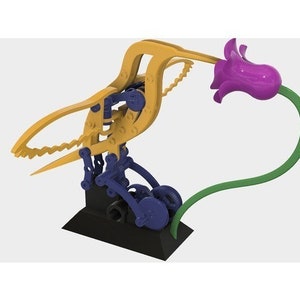 May include: A yellow and blue mechanical bird sculpture with a purple flower on a green stem. The bird's beak is open and the flower is facing the beak.
