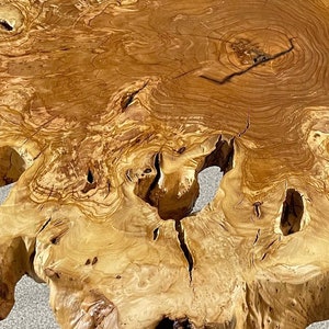 Rustic coffee table out of an olive wood cookie slab #1 - 64 x 53 cm - Swiss Made