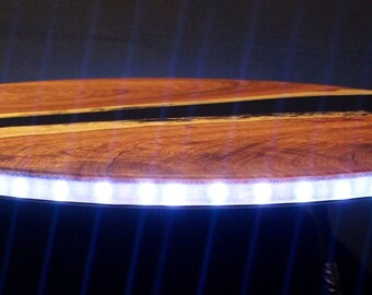 LED-lit coffee table out of noble Sheesham wood - Diameter 58 cm - Swiss Made
