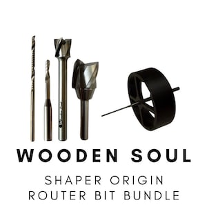 May include: A collection of router bits for woodworking, including various drill bits and a black circular cutting tool. The text "WOODEN SOUL" and "SHAPER ORIGIN ROUTER BIT BUNDLE" are displayed below the tools.