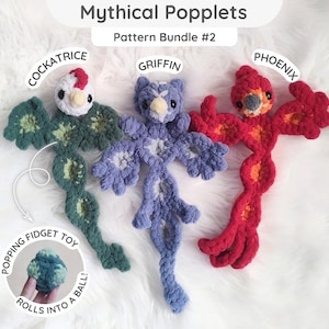 May include: Three crocheted plush toys labeled Mythical Popplets Pattern Bundle #2, featuring a green Cockatrice, a purple Griffin, and a red Phoenix. Each creature has a flat, segmented body and a small inset circle that functions as a popping fidget toy.