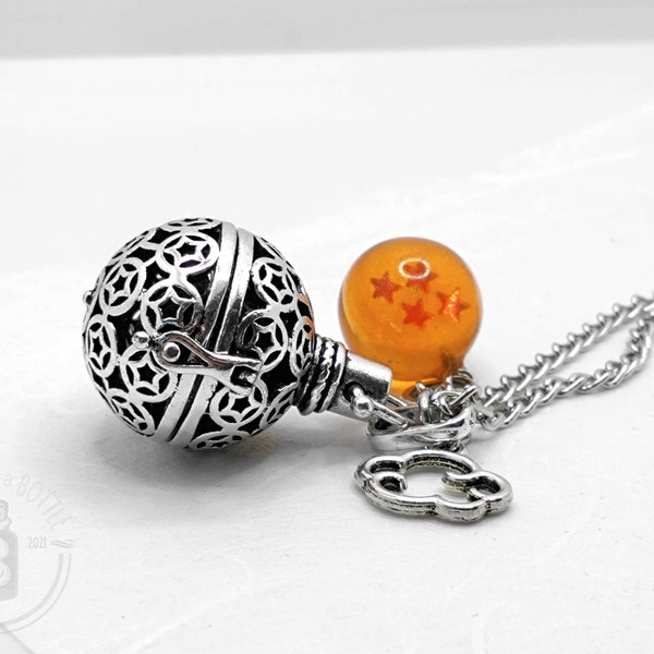 Silver tone scent infuser with four star dragon ball style resin sphere and 27 inch chain
