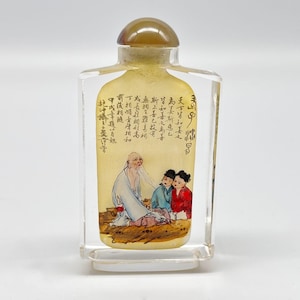 Chinese Reverse Hand-Painted Glass Snuff Bottle With Family Scene And Script