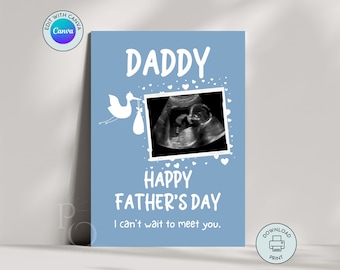 May include: A blue card with white text that reads "Daddy Happy Father's Day I can't wait to meet you."  A white silhouette of a stork carrying a baby is above a black and white ultrasound image.