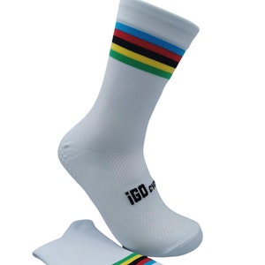 May include: White cycling socks with a rainbow stripe design and the text "iGO cycle" on the side.
