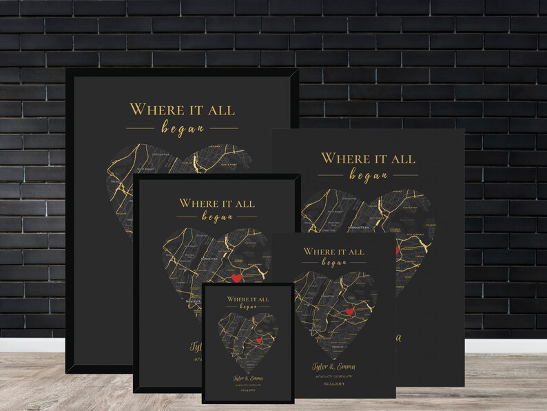 May include: Four black framed prints with gold and red accents. Each print features a heart-shaped map with the text "Where it all began" and a couple's names. The prints are arranged in a size progression, with the largest print at the top and the smallest print at the bottom.