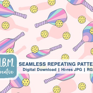 May include: A seamless repeating pattern featuring colorful paddleball rackets and yellow balls on a pink background. The pattern is perfect for creating fun and sporty designs for fabric, wallpaper, or other creative projects.