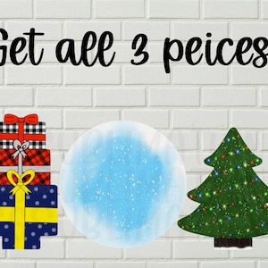 May include: A set of three Christmas decorations: a stack of three wrapped presents, a blue and white snow globe, and a green Christmas tree with colorful lights.