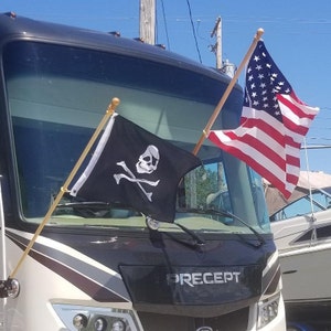 Our Flag holder is the best!  It&#39;s portable which means one can display a flag anywhere on any smooth flat surface.