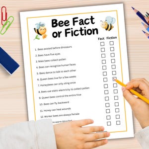May include: A printable bee fact or fiction game with 12 questions and a fact or fiction column with check boxes. The game features a cartoon bee illustration.