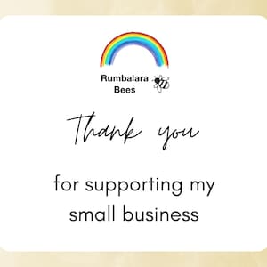 May include: A white thank you card with a rainbow and bee logo that says "Rumballara Bees". The card says "Thank you for supporting my small business."