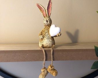 Resin Rabbit Ornament with Dangling Legs Holding White Heart