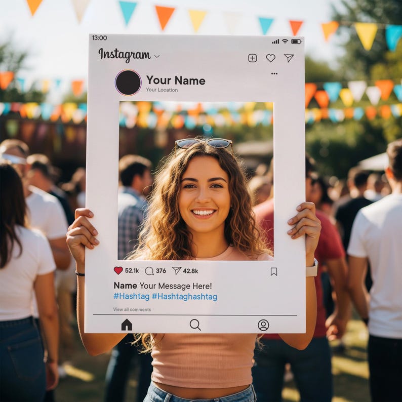 May include: A woman smiling, holding a large white Instagram-style photo frame. The frame includes the Instagram logo, a profile picture placeholder, and text that reads "Your Name" and "Your Location". The frame also displays like, comment, and share icons.
