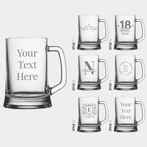 May include: Six different styles of personalised beer mugs with various text and designs. The mugs are clear glass with a handle. The designs include a name, a birthday message, and a monogram.