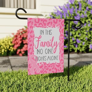 In This Family No One Fights Alone Breast Cancer Ribbon Garden Banner