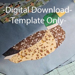 May include: A fabric duck applique with a green plaid head, brown and yellow floral patterned body, and a yellow beak. The applique is on a light blue fabric background. The text "-Digital Download-Template Only-" is at the top.