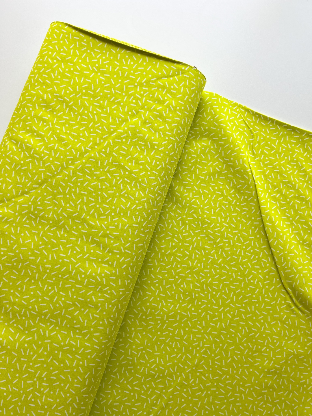 Cotton and Steel Snap to Grid Little Pill Dot Citron Fabric Sold by 1/2