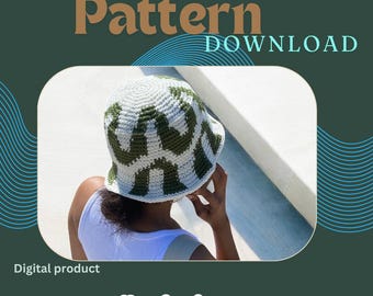May include: A white and green crochet bucket hat with a geometric pattern. The hat is being worn by a person. The text "NEW Pattern DOWNLOAD" is at the top of the image. The text "Digital product" is at the bottom of the image. The text "Knotorious" is at the bottom of the image.