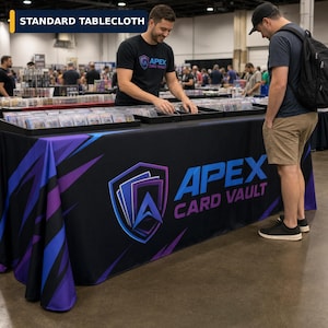 May include: A black tablecloth featuring a large blue and purple shield logo with the text APEX CARD VAULT in blue and purple lettering. The fabric has a dynamic abstract pattern of blue and purple streaks against a black background.