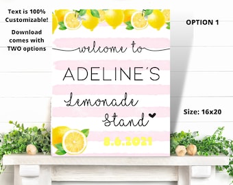 May include: A pink and white striped sign with lemons and green leaves around the top. The sign says "Welcome to Adeline's Lemonade Stand 8.6.2021". The sign is 16x20 inches.