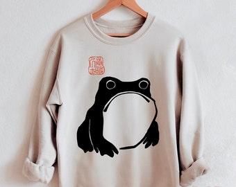 Sudadera unisex con estética japonesa de sapo divertido, arte de estilo vintage, jersey orgánico de cuello redondo, diseño de Matsumoto Hoji, camiseta de rana poco impresionada.