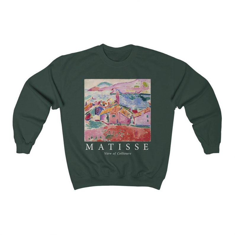 May include: Dark green sweatshirt with a print of a Matisse painting, "View of Collioure." The artwork shows a coastal scene with buildings and water. The word "MATISSE" and "View of Collioure" are printed below the artwork in white.