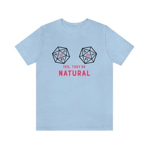 May include: Light blue t-shirt with a graphic of two twenty-sided dice, with the text "YES, THEY'RE NATURAL" printed below.