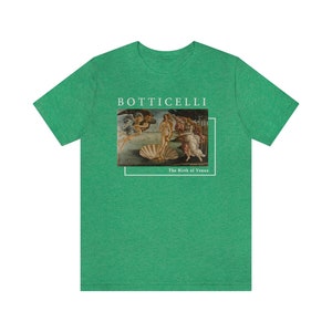 May include: Green t-shirt with a white print of Sandro Botticelli's "The Birth of Venus" painting. The print includes the artist's name and the title of the artwork.