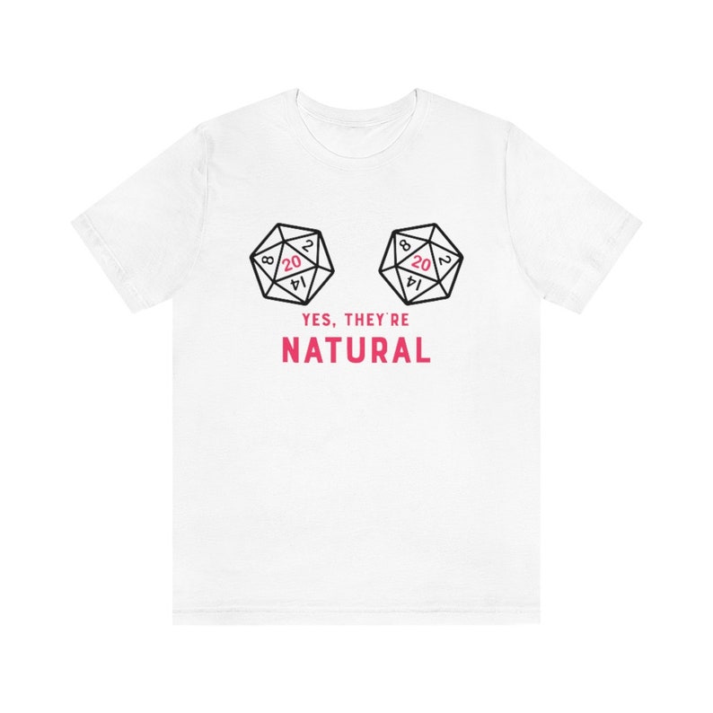 May include: White t-shirt with a graphic of two 20-sided dice, with the text "YES, THEY'RE NATURAL".