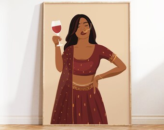 May include: A woman in a maroon and gold embroidered outfit holds a glass of red wine. She is wearing a nose ring and has her hair pulled back.