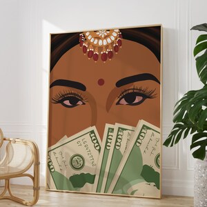 May include: A digital illustration of a woman's face with a red bindi on her forehead. She is wearing a gold and red headpiece and her eyes are looking at the viewer.  She is holding a stack of US dollar bills in front of her face.