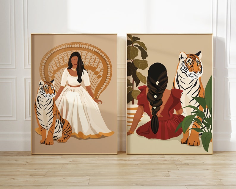 May include: Two digital art prints featuring women with tigers. The first print shows a woman in a white dress sitting on a wicker chair with a tiger beside her. The second print shows a woman in a red dress sitting with a tiger behind her.