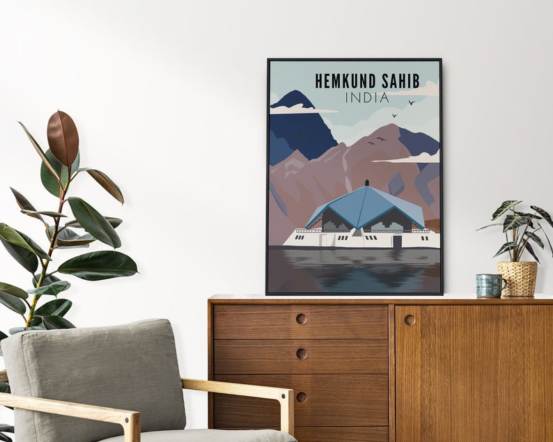 May include: A poster with a blue and white illustration of a building with a blue roof, surrounded by mountains and water. The text "HEMKUND SAHIB INDIA" is at the top of the poster.