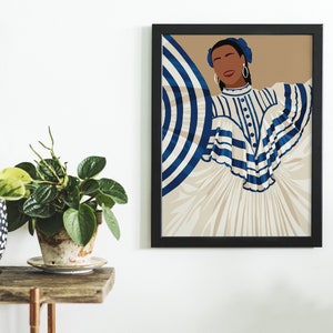 May include: A framed illustration of a woman wearing a white and blue striped dress with a large blue and white striped umbrella behind her. The background is a light brown colour.
