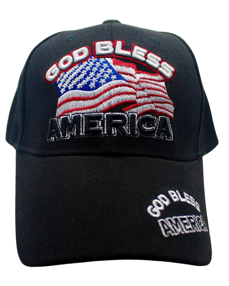 May include: A black baseball cap with an embroidered American flag and the text "God Bless America". The text "God Bless America" is also embroidered on the back of the cap.
