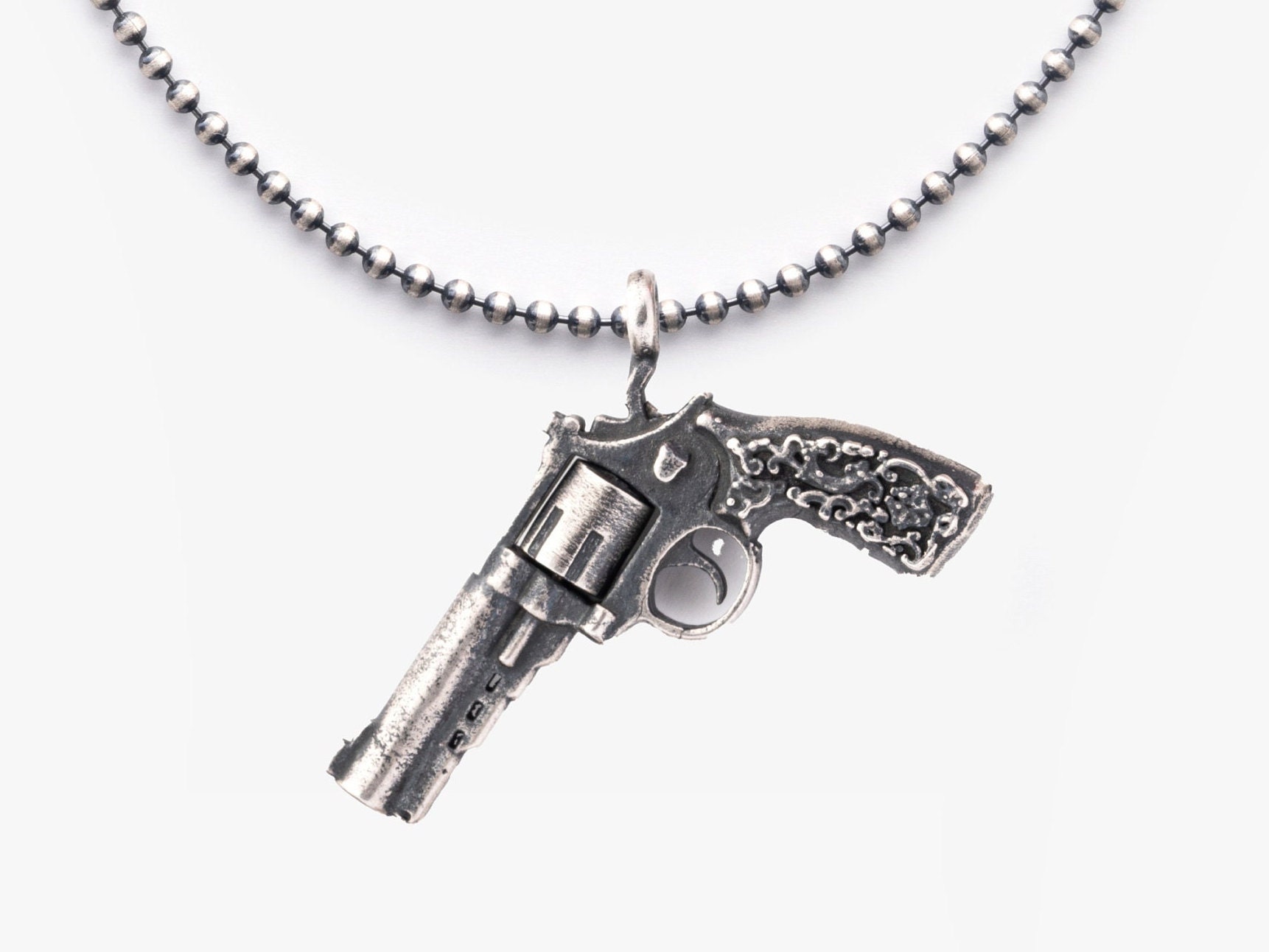 Pendentifs en argent avec pistolet cowboy