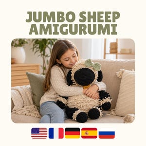 May include: A jumbo sheep amigurumi toy featuring a cream-colored textured body, black head, black limbs, and a small sage green bow attached to the top of the head. The text JUMBO SHEEP AMIGURUMI is displayed in large green letters above the sheep toy.