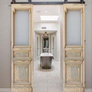 Rustic Wooden Entry Door: Handcrafted Geometric Carvings, Distressed Patina